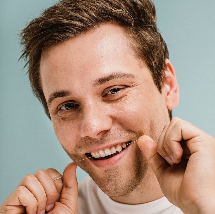 Man using a dental floss